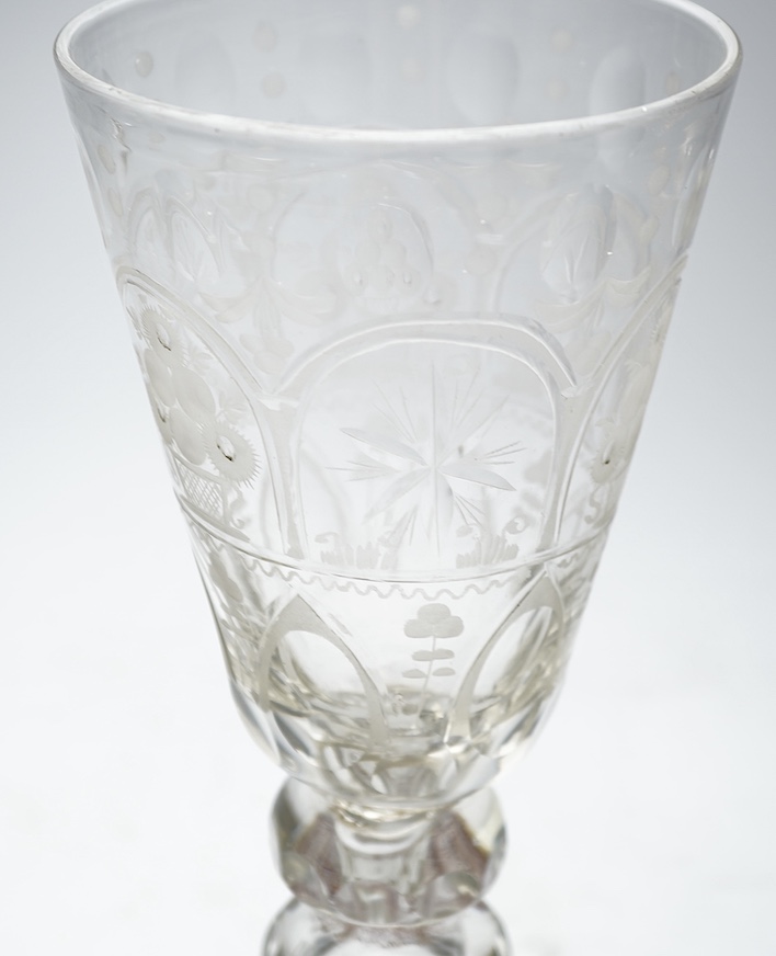 A tall Bohemian faceted glass goblet, c.1750